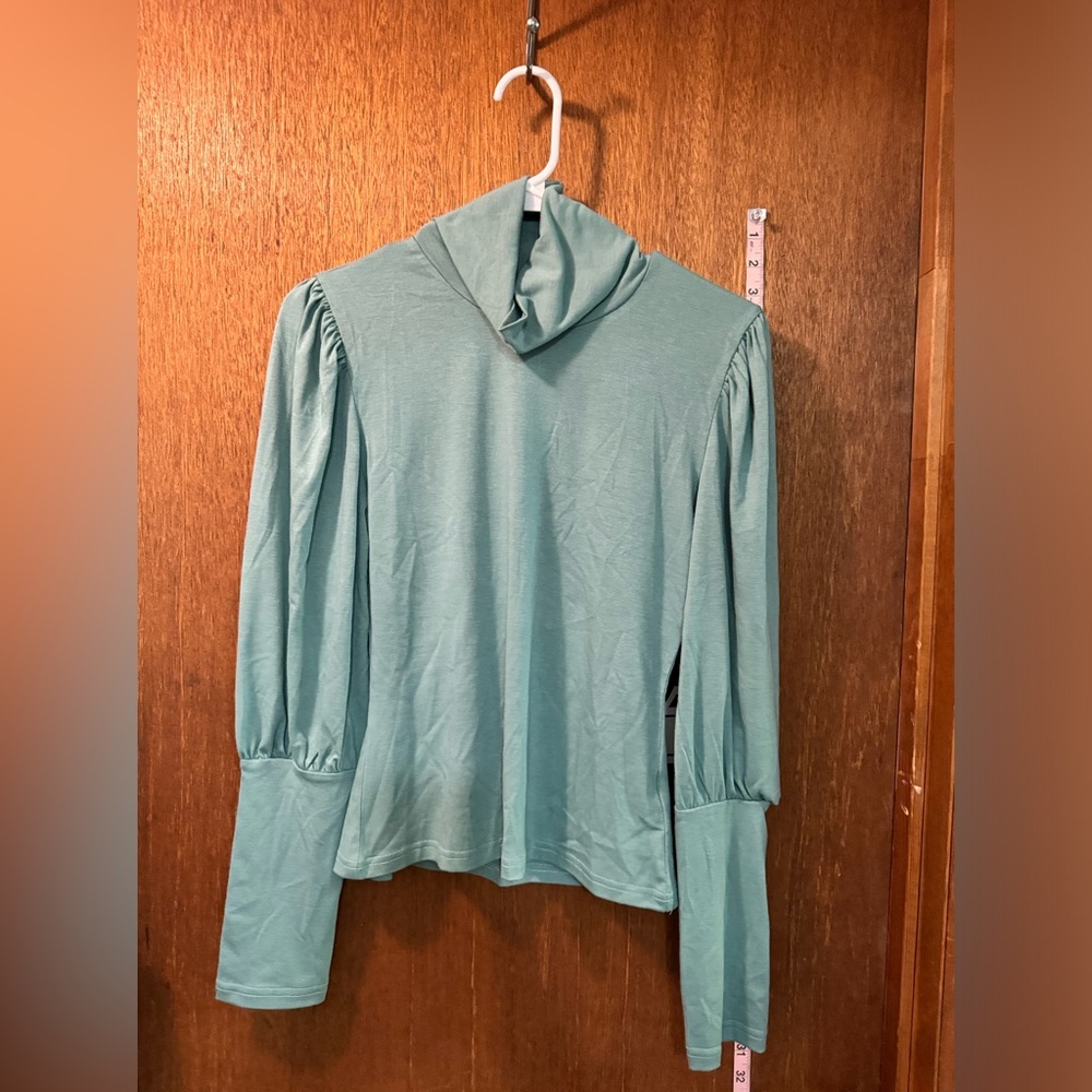 3 mock neck long-puff sleeve tops for sale.